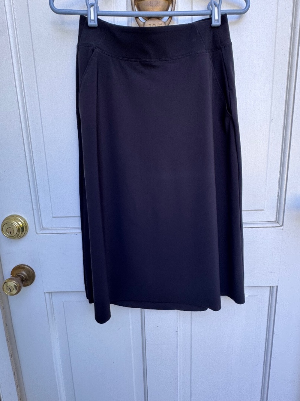 Athleta Cosmic Skirt Size Small Black High Low Stretch Zip Pockets Travel